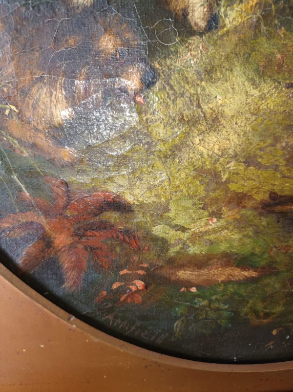 A George Armfield Terriers Chasing Rabbit painting within a circular frame.