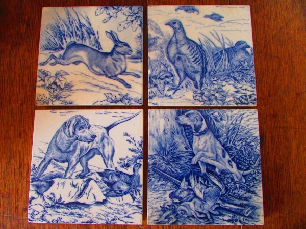 Set of four blue and white *RARE* Josiah Wedgwood game tiles with animals.